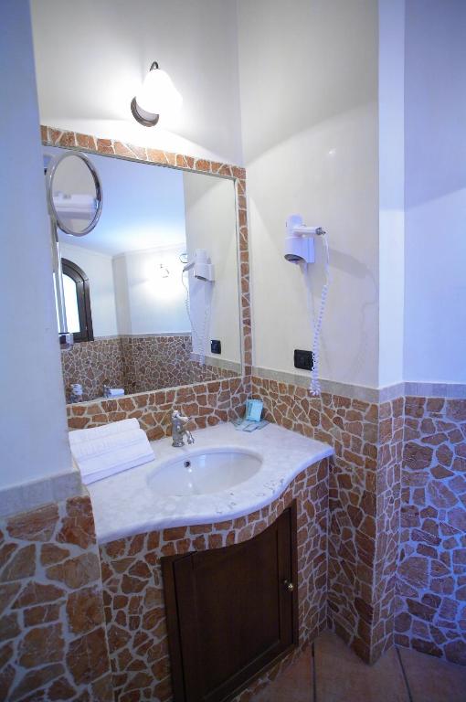 Koupelna v ubytování Airone Wellness Hotel