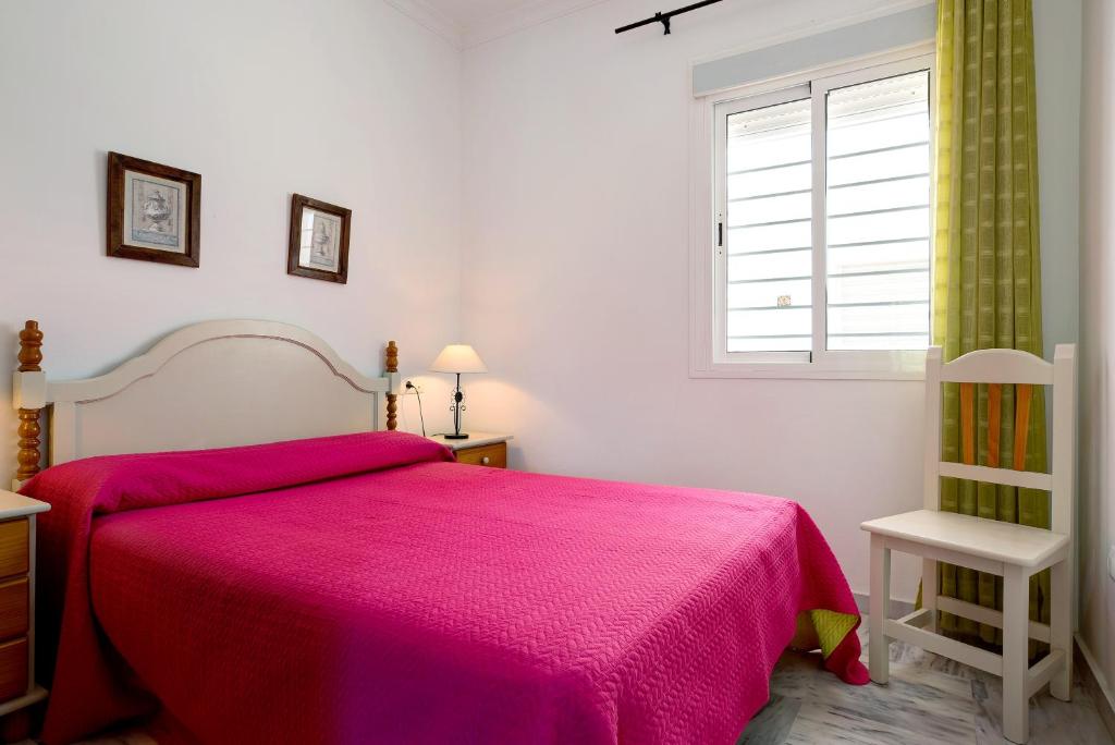 Posteľ alebo postele v izbe v ubytovaní Apartamento Mediterraneo 105