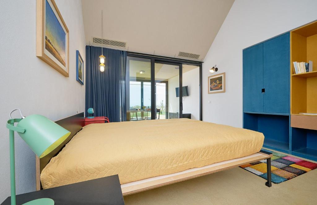 Postel nebo postele na pokoji v ubytování Petrantica Resort
