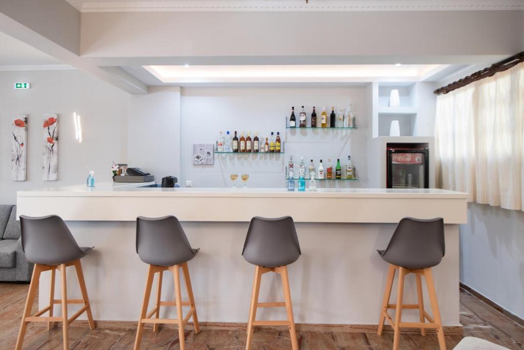 Nápoje v ubytování Hotel Nostos