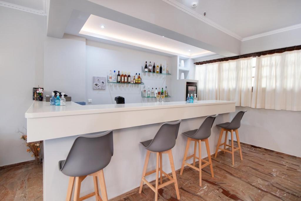 Nápoje v ubytování Hotel Nostos