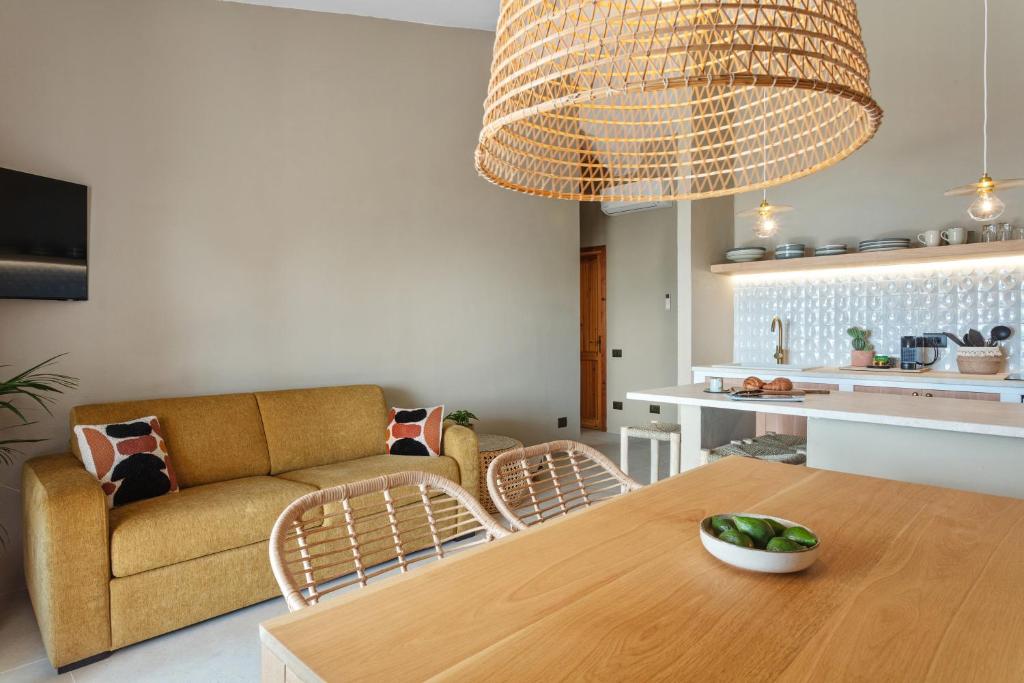 Кухня или мини-кухня в Baia Dorata beach apartments
