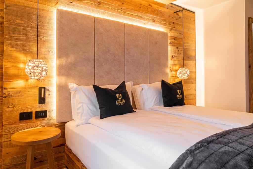 Postel nebo postele na pokoji v ubytování Araldo Eco-Lodge