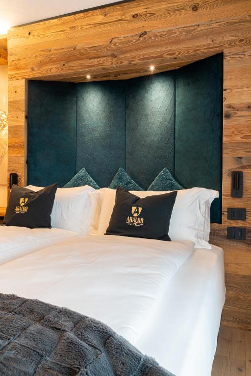 Postel nebo postele na pokoji v ubytování Araldo Eco-Lodge