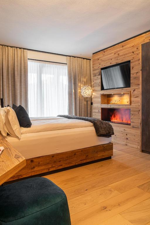 Postel nebo postele na pokoji v ubytování Araldo Eco-Lodge