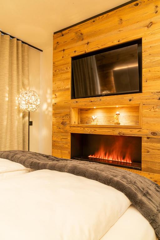 Postel nebo postele na pokoji v ubytování Araldo Eco-Lodge
