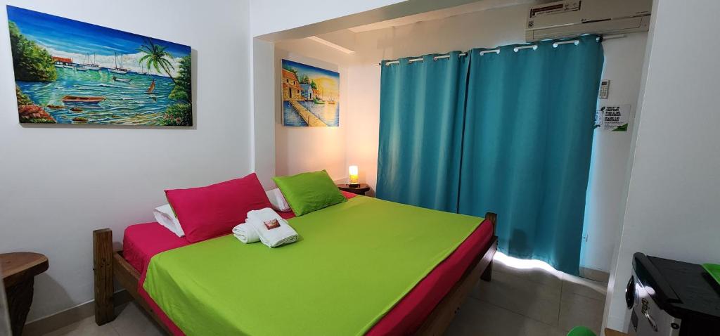 Postel nebo postele na pokoji v ubytování Karibbik Haus Hostel