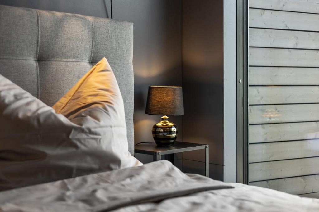 Ένα ή περισσότερα κρεβάτια σε δωμάτιο στο KODA LOFT EXTENDED - Urlaub im Tiny House Bodensee