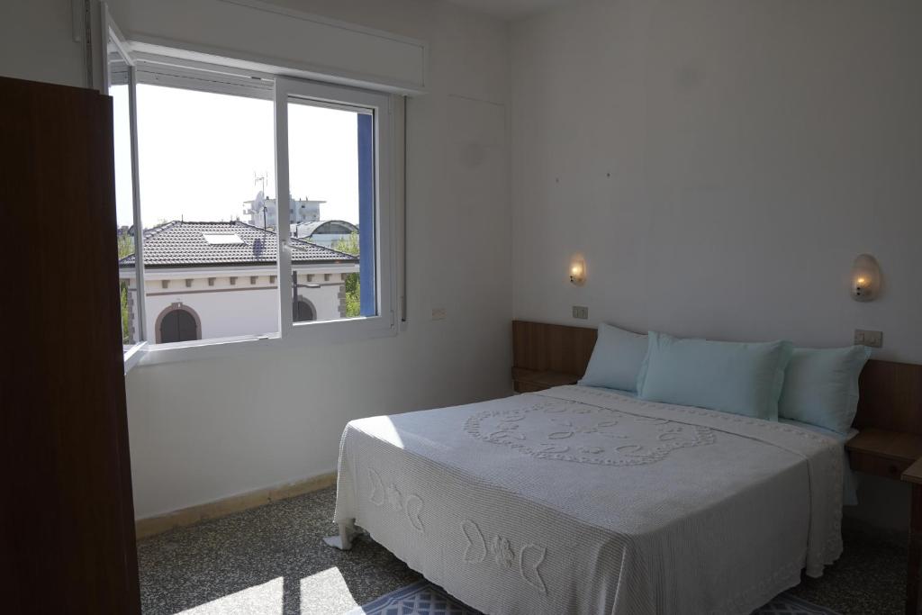 Postel nebo postele na pokoji v ubytování Hotel Aurora Nord