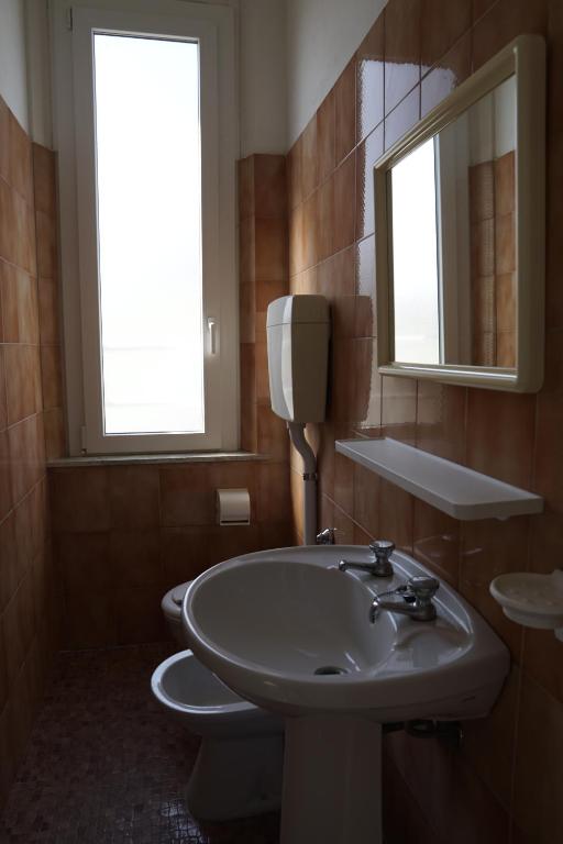 Koupelna v ubytování Hotel Aurora Nord