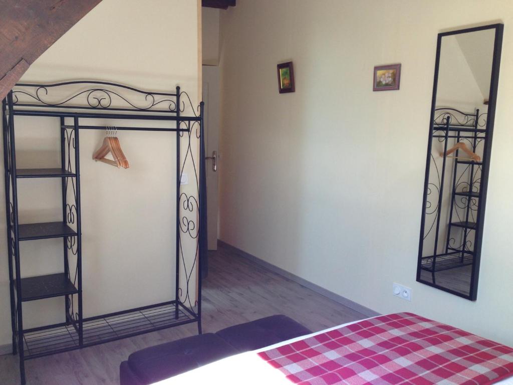 Cama ou camas em um quarto em Entre Lot et Dordogne