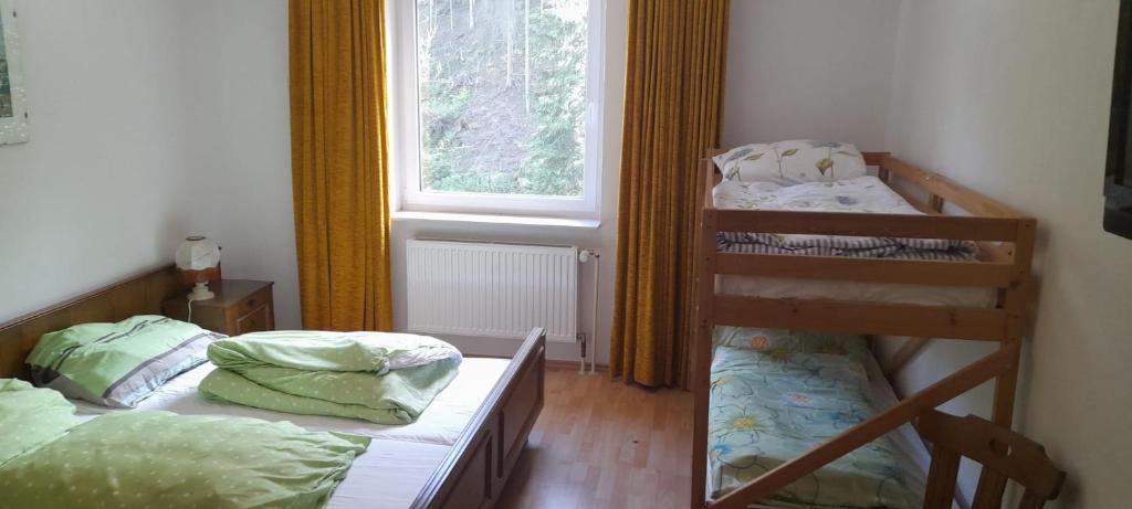 Postel nebo postele na pokoji v ubytování Gasthof Wabitsch