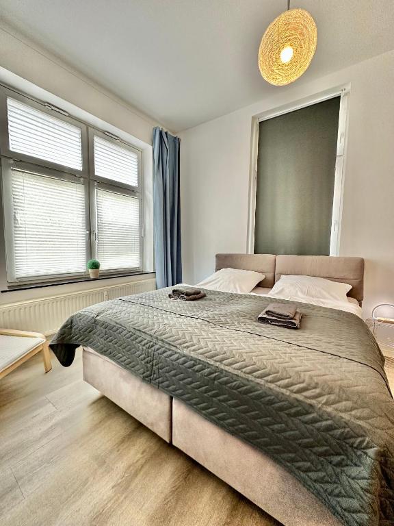 Erholsame City-Erdgeschosswohnung mit Veranda, Grill und Parkplatz D46EG
