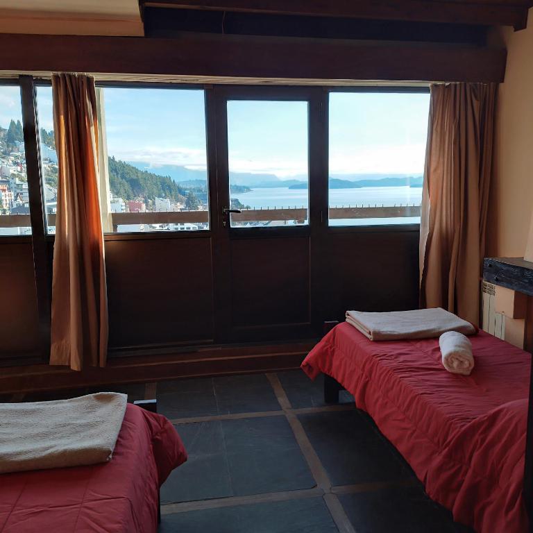 Postel nebo postele na pokoji v ubytování Hospedaje Penthouse 1004