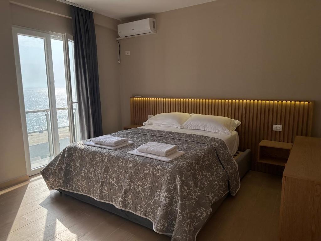 Postel nebo postele na pokoji v ubytování CoastAL