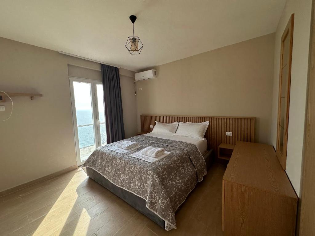 Postel nebo postele na pokoji v ubytování CoastAL