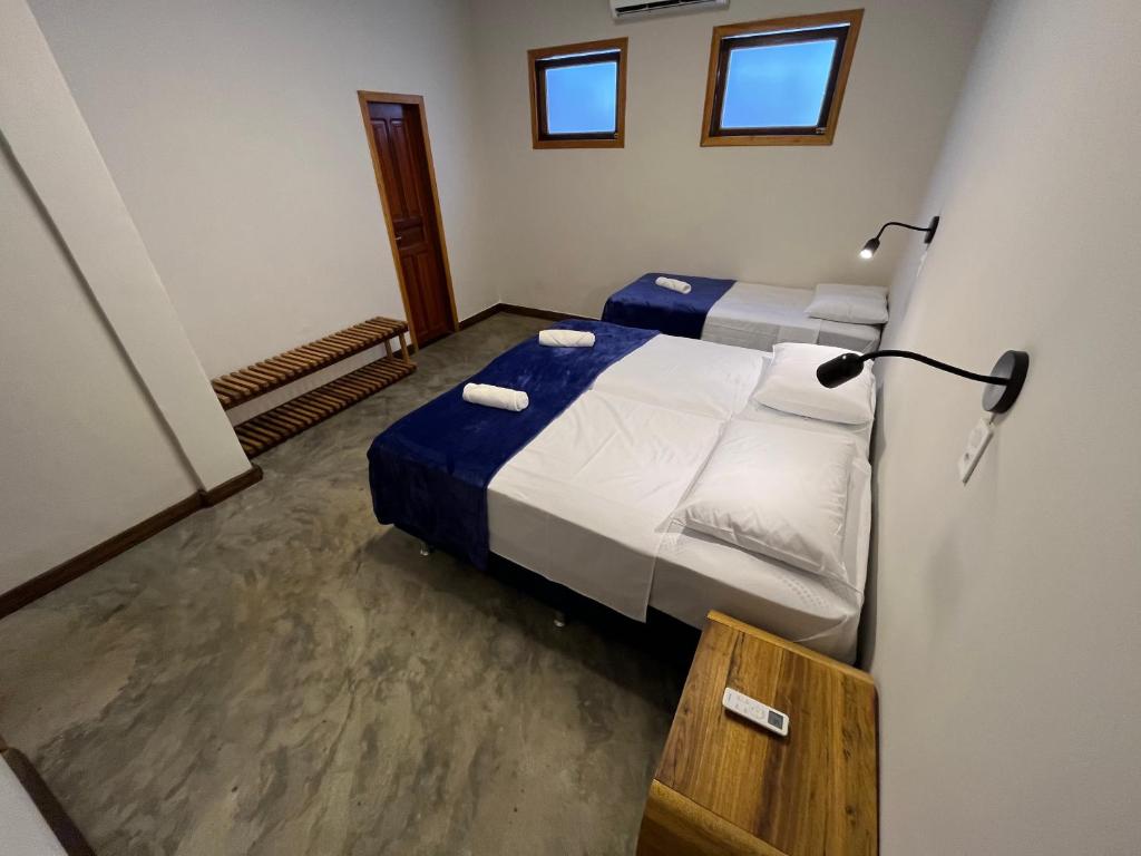 Postel nebo postele na pokoji v ubytování Local Hostel Novo Airão