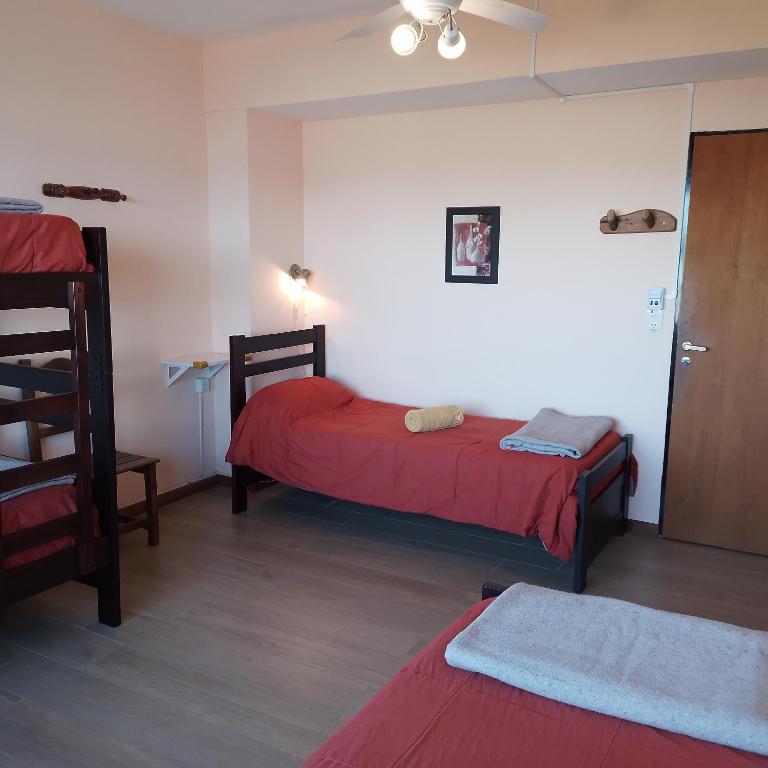 Postel nebo postele na pokoji v ubytování Hospedaje Penthouse 1004