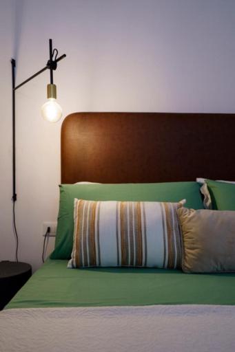 A bed or beds in a room at REAL STREET 21