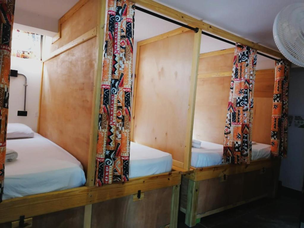 Postel nebo postele na pokoji v ubytování Karibbik Haus Hostel