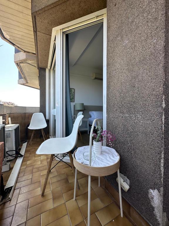 A balcony or terrace at Plaza Spain Barcelona Apartments