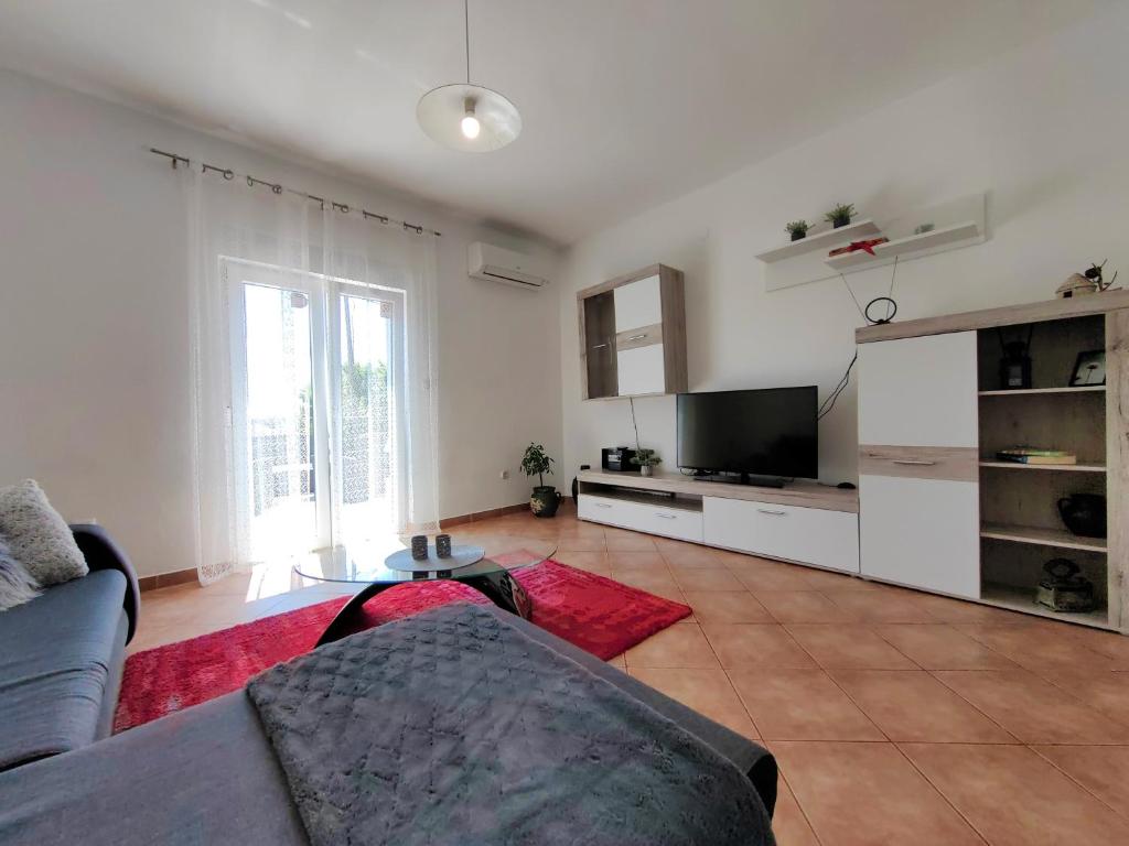 TV a/nebo společenská místnost v ubytování Casa Istriana Pula