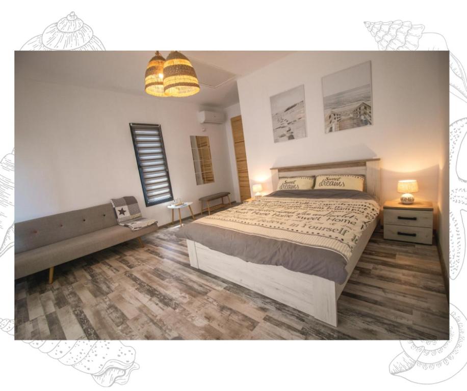 Postel nebo postele na pokoji v ubytování Flip Flop Bungalows