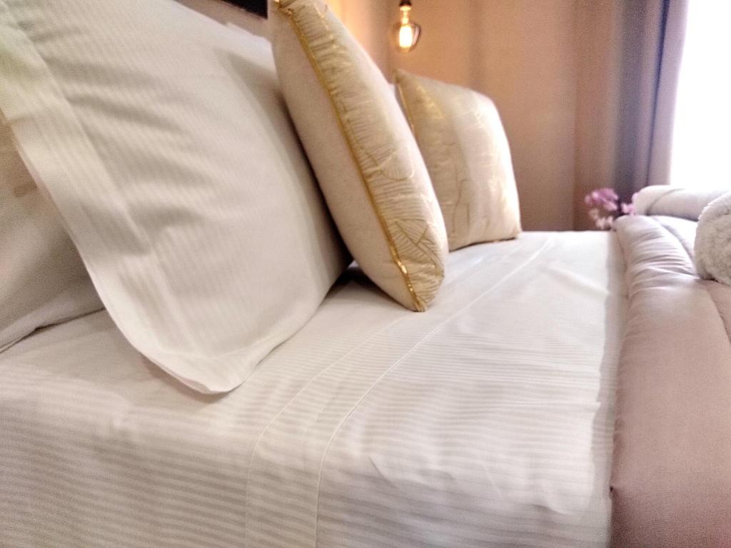 Postel nebo postele na pokoji v ubytování Ti Scialíi Suites Rooms and Relax