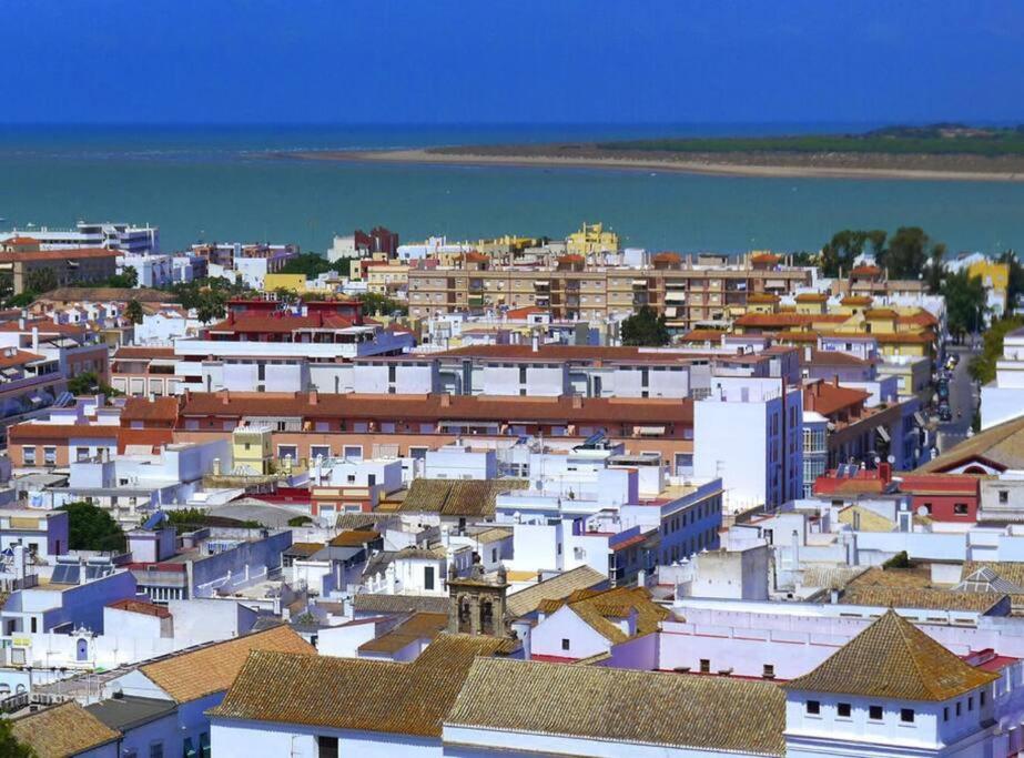 Nespecifikovaný výhled na destinaci Sanlúcar de Barrameda nebo výhled na město při pohledu z chaty