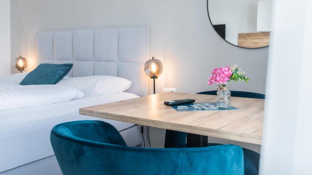 Postel nebo postele na pokoji v ubytování Marienhof Apartments