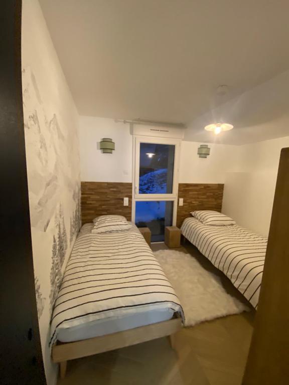 Krevet ili kreveti u jedinici u okviru objekta Appartement neuf tout confort 55 m2 - 2 chambres pour 4/6 personnes