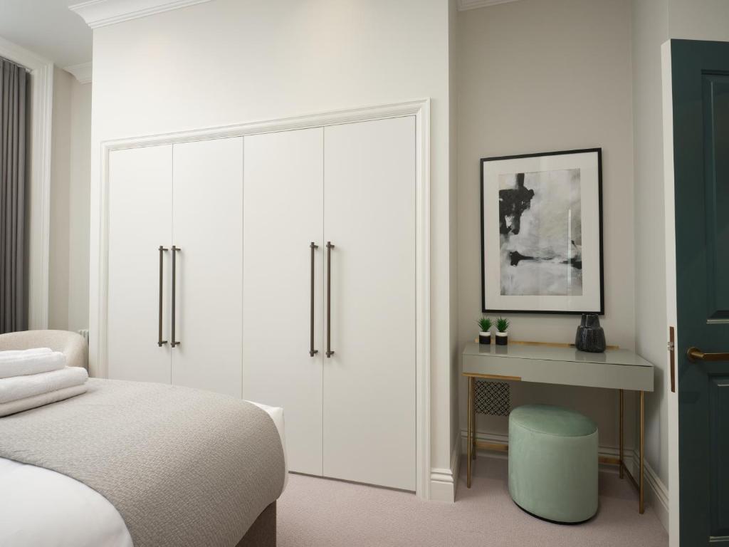 Postel nebo postele na pokoji v ubytování Mayfair - Peterson House