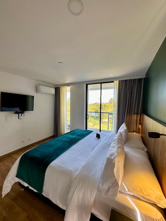 Postel nebo postele na pokoji v ubytování Hotel Lagoon