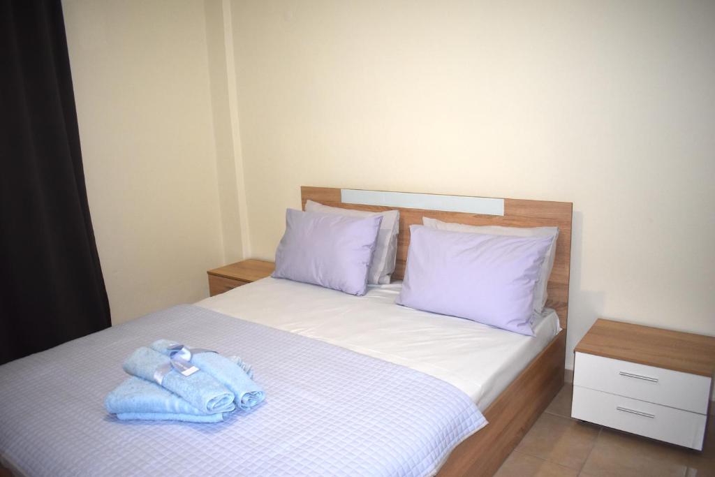 Postel nebo postele na pokoji v ubytování Absolute Apartment