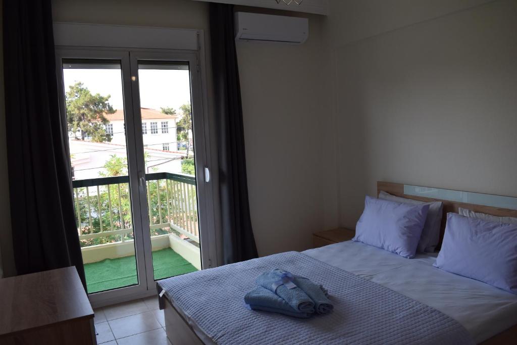 Postel nebo postele na pokoji v ubytování Absolute Apartment