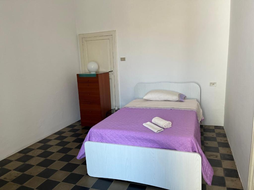 Voodi või voodid majutusasutuse Palazzo Storico Mileto toas