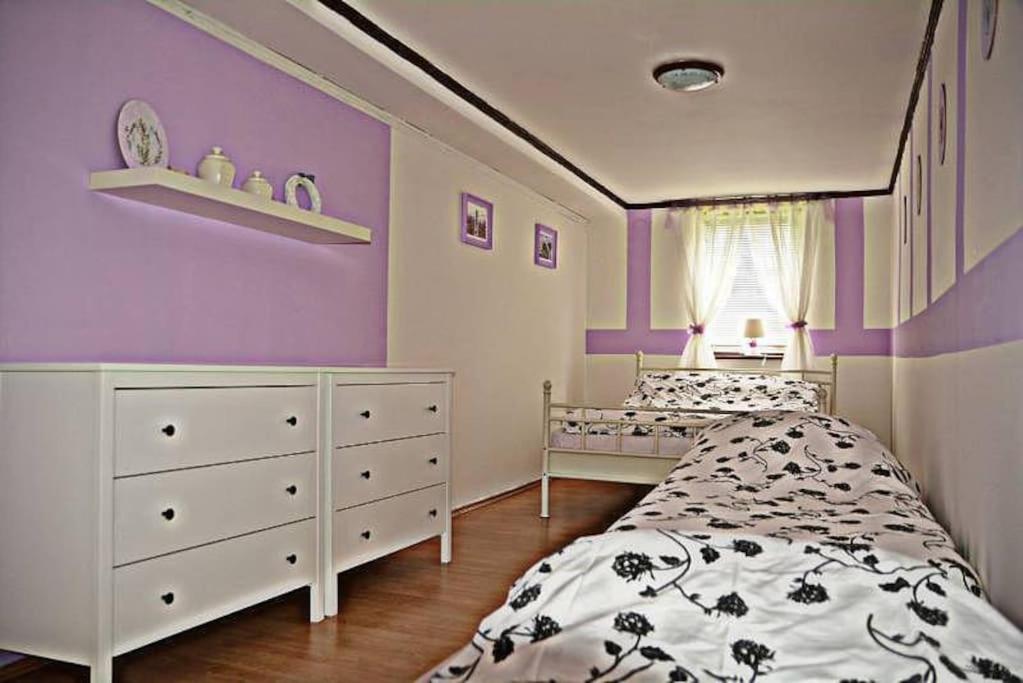 Postel nebo postele na pokoji v ubytování Chalupa U tří soviček.