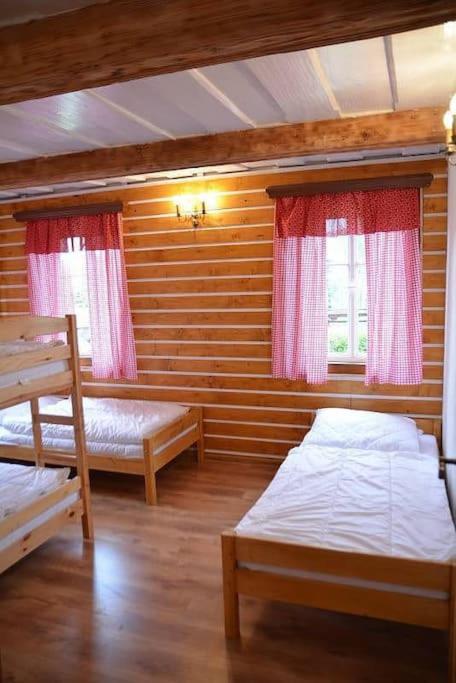 Postel nebo postele na pokoji v ubytování Chalupa U tří soviček.