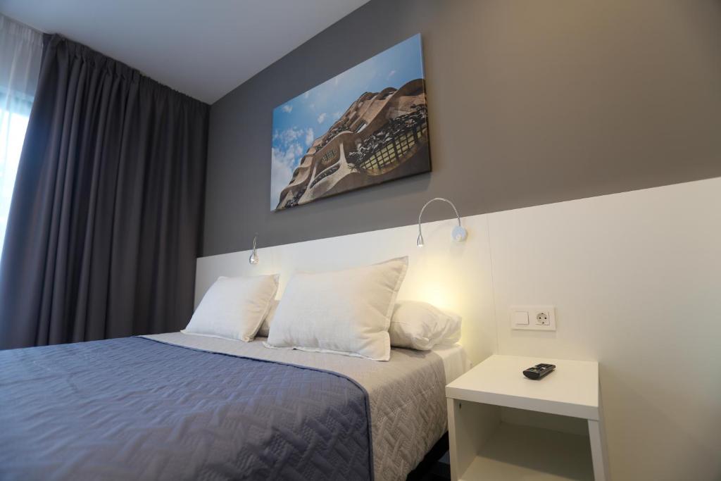 Postel nebo postele na pokoji v ubytování Hotel C31