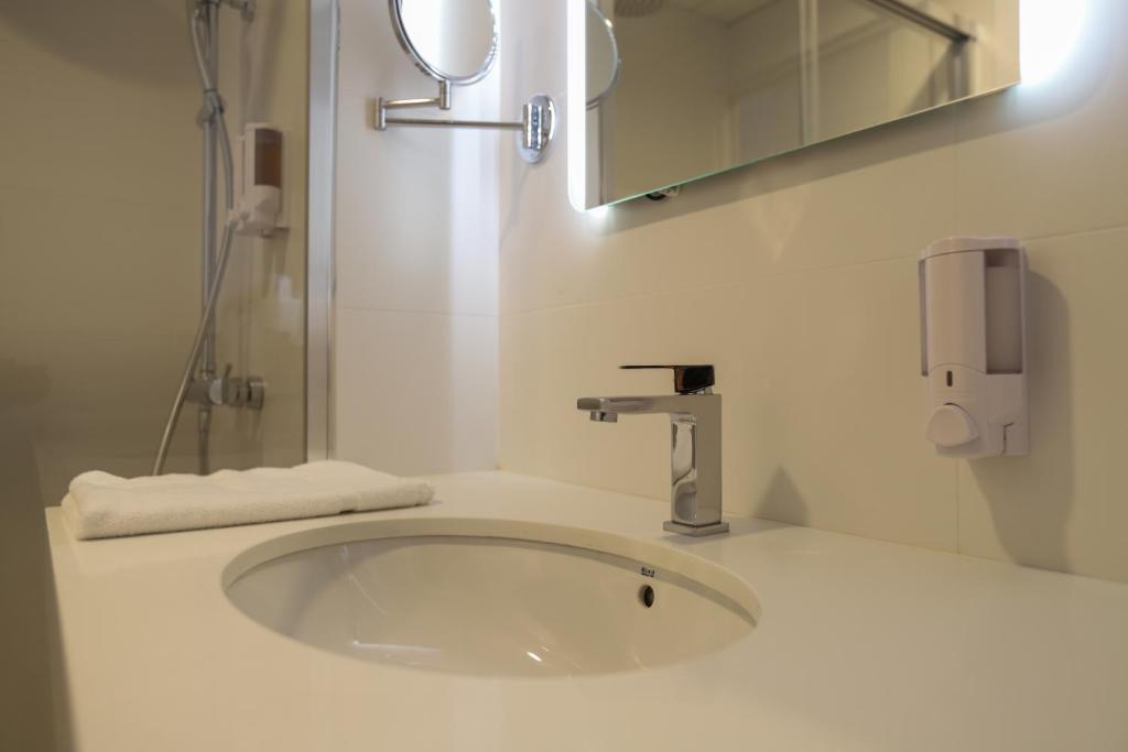 Koupelna v ubytování Hotel C31