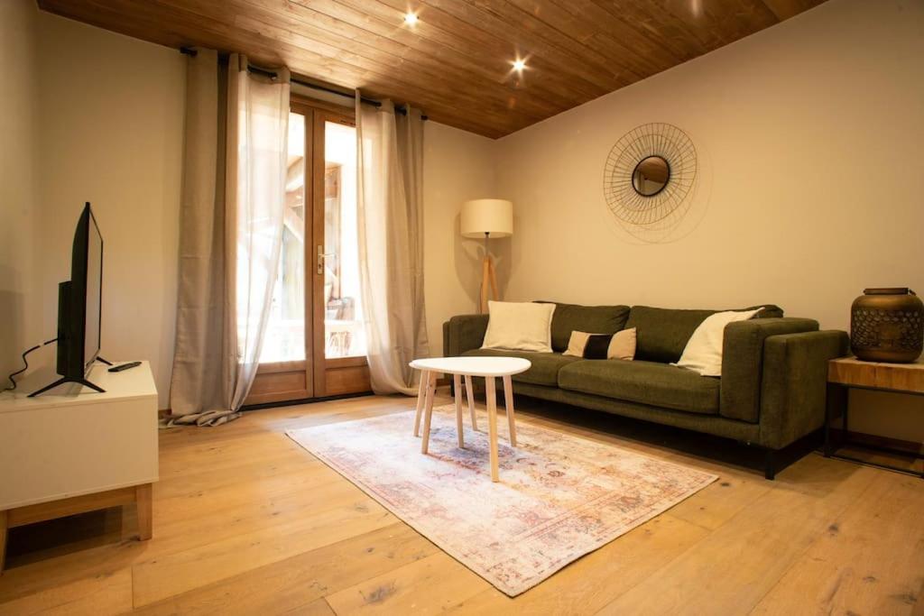 O zonă de relaxare la Appartement cosy Rez-de-jardin