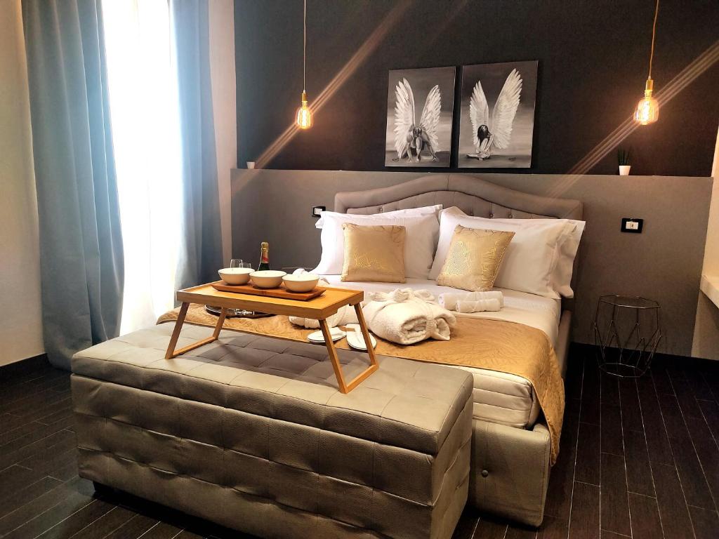 Postel nebo postele na pokoji v ubytování Ti Scialíi Suites Rooms and Relax