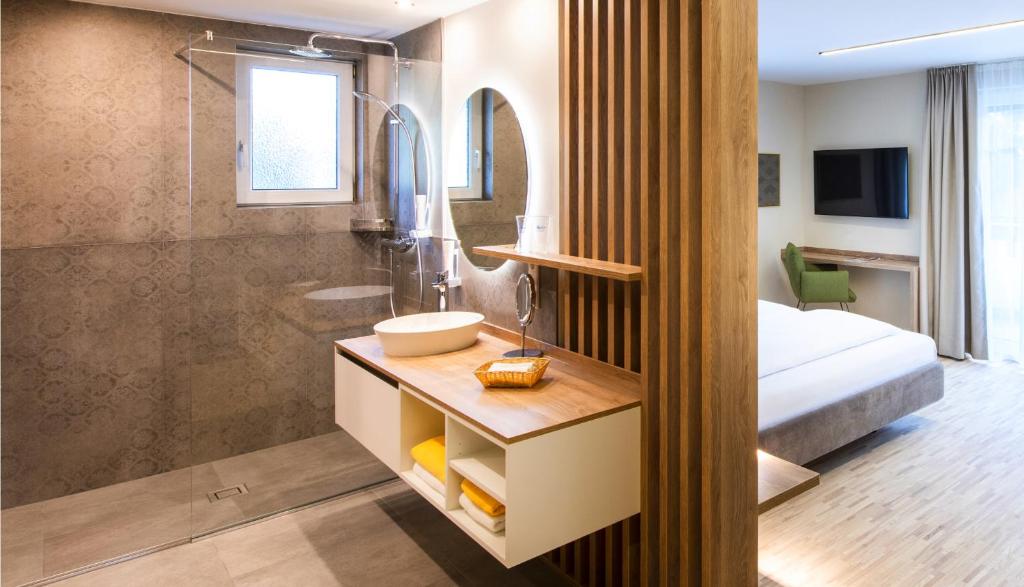 Postel nebo postele na pokoji v ubytování Hotel Himmelreich