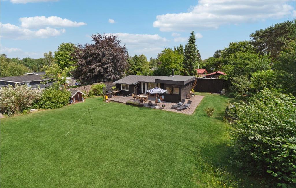 an aerial view of a house with a yard at Nice Home In Jgerspris With Kitchen in Jægerspris