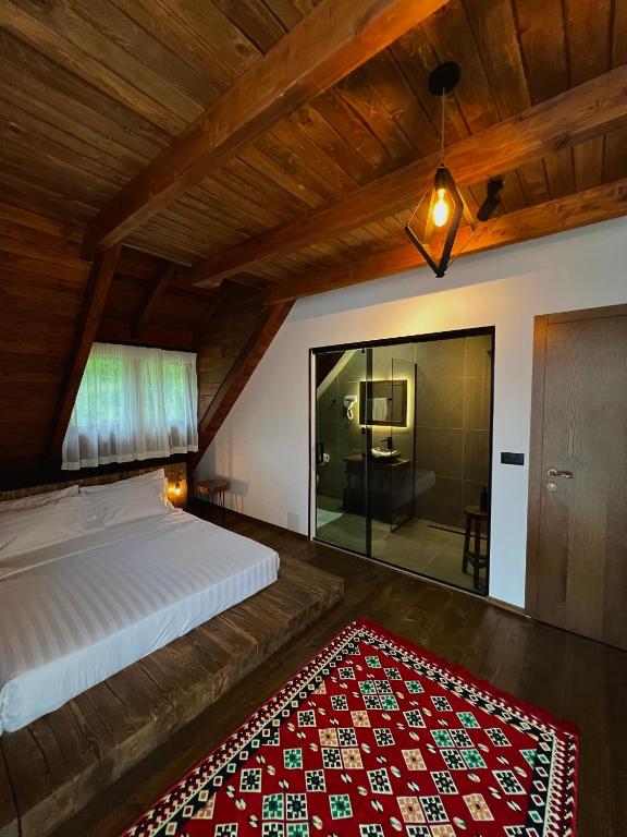 Postel nebo postele na pokoji v ubytování Molla Guest House