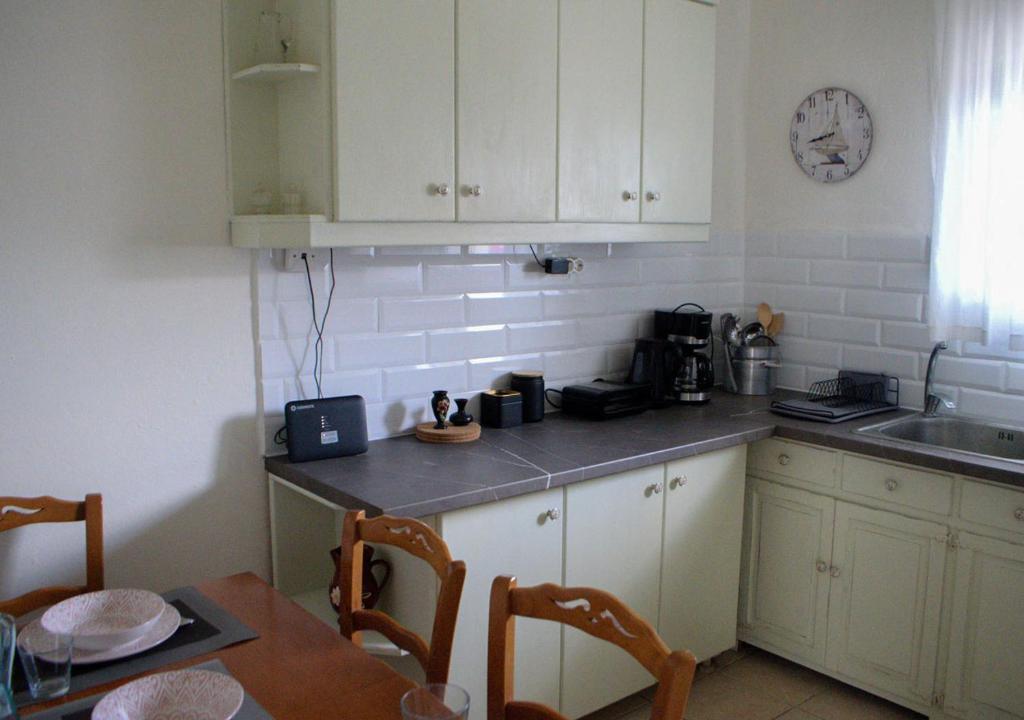 Kuchyň nebo kuchyňský kout v ubytování Lemon House