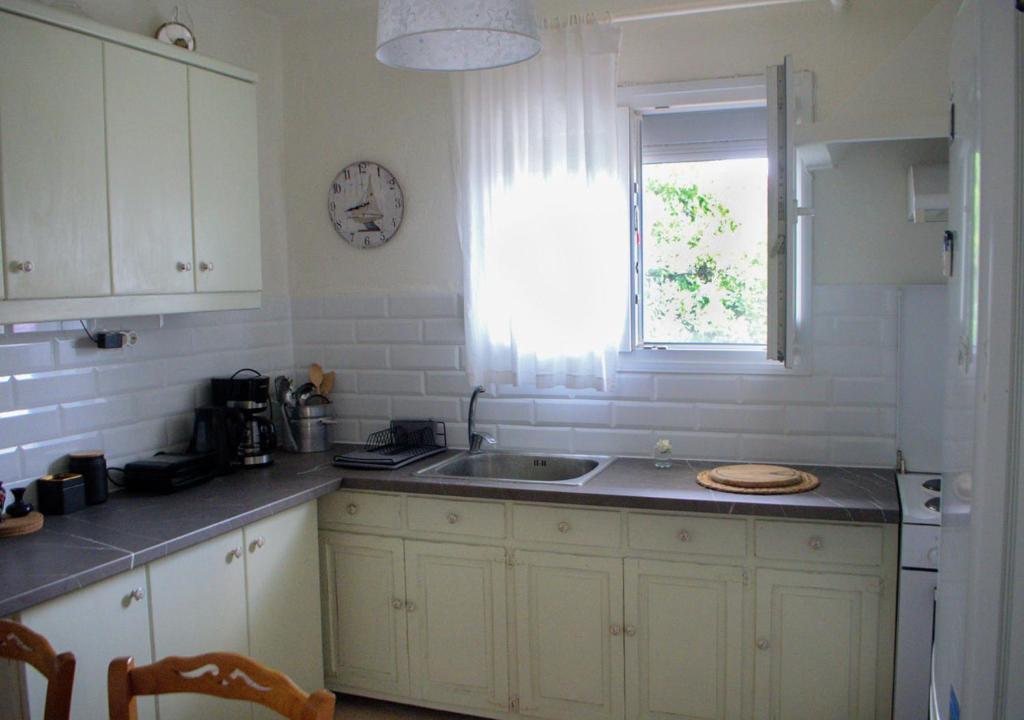 Kuchyň nebo kuchyňský kout v ubytování Lemon House