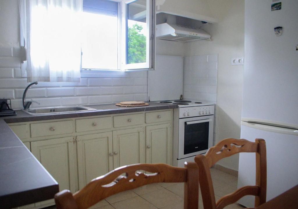 Kuchyň nebo kuchyňský kout v ubytování Lemon House