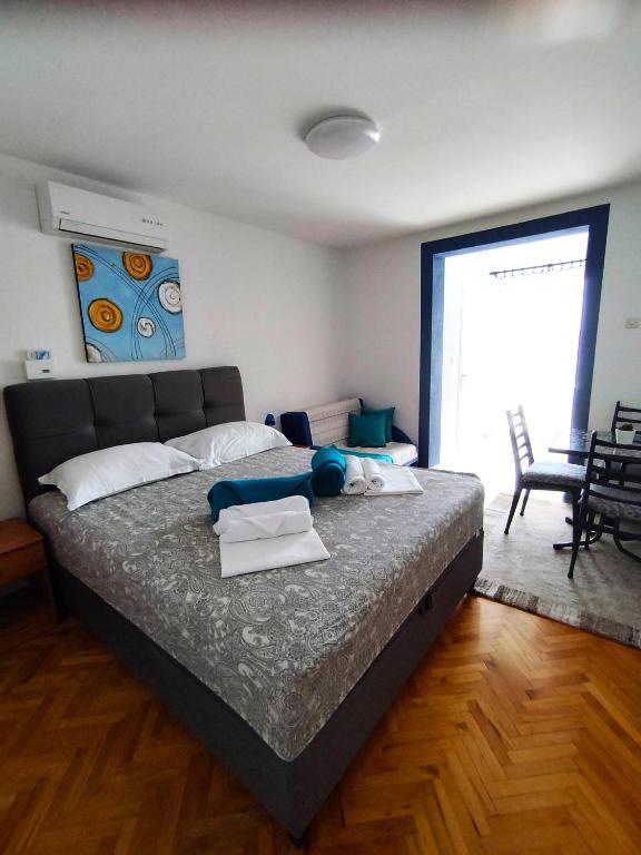 Postel nebo postele na pokoji v ubytování Anita Apartments