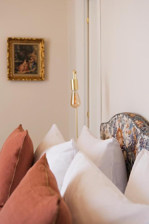 Postel nebo postele na pokoji v ubytování L'Abbaye Hôtel